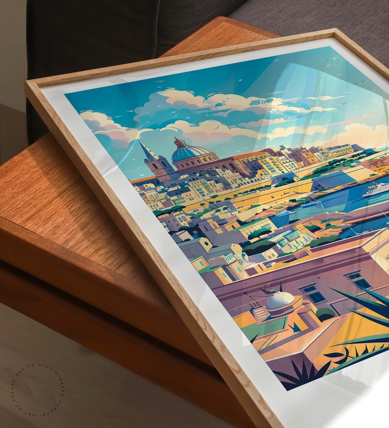 May include: A colorful illustration of a cityscape with a large church building in the center. The city is surrounded by water and has a bright blue sky with white clouds. The illustration is framed in a wooden frame.