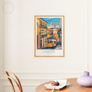 May include: A colorful illustration of a yellow tram traveling up a hill in Lisbon, Portugal. The tram is surrounded by colorful buildings and a blue sky. The text "LISBON, PORTUGAL" is at the bottom of the image.