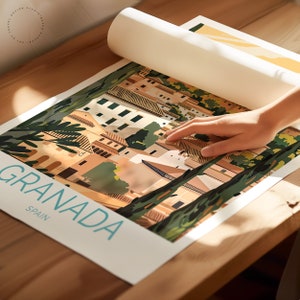 Puede incluir: Una ilustraci&oacute;n colorida de la ciudad de Granada, Espa&ntilde;a. La ilustraci&oacute;n presenta un paisaje urbano con edificios, &aacute;rboles y un cielo azul. El texto "GRANADA" est&aacute; escrito en una fuente grande y en negrita en la parte inferior de la ilustraci&oacute;n, con la palabra "ESPA&Ntilde;A" escrita en una fuente m&aacute;s peque&ntilde;a debajo.