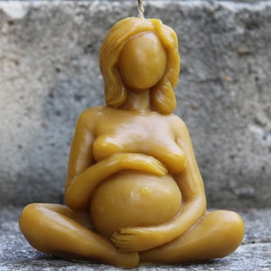 Pregnant woman hugging her belly, hand-poured beeswax candle, safe for pregnant women, a great gift for her