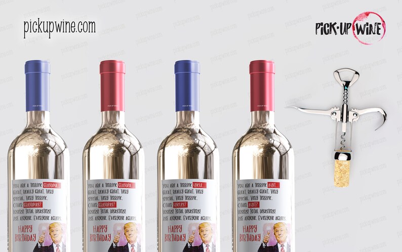 May include: Four silver wine bottles with labels that say "You are a Trump Grandpa! You are really great! Very special! Very Trump."  The labels also feature a picture of Donald Trump holding a glass of wine. The bottles have red and blue caps. A corkscrew is in the background.