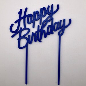 May include: Blue plastic cake topper with the words "Happy Birthday" in a cursive font.