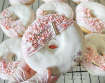 Pink full size decorated donuts