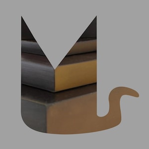 May include: Close-up of three stacked wooden blocks in shades of brown and gold. The blocks are arranged in a stepped pattern, with the top block partially obscured by a gray shape. The edges of the blocks are visible.