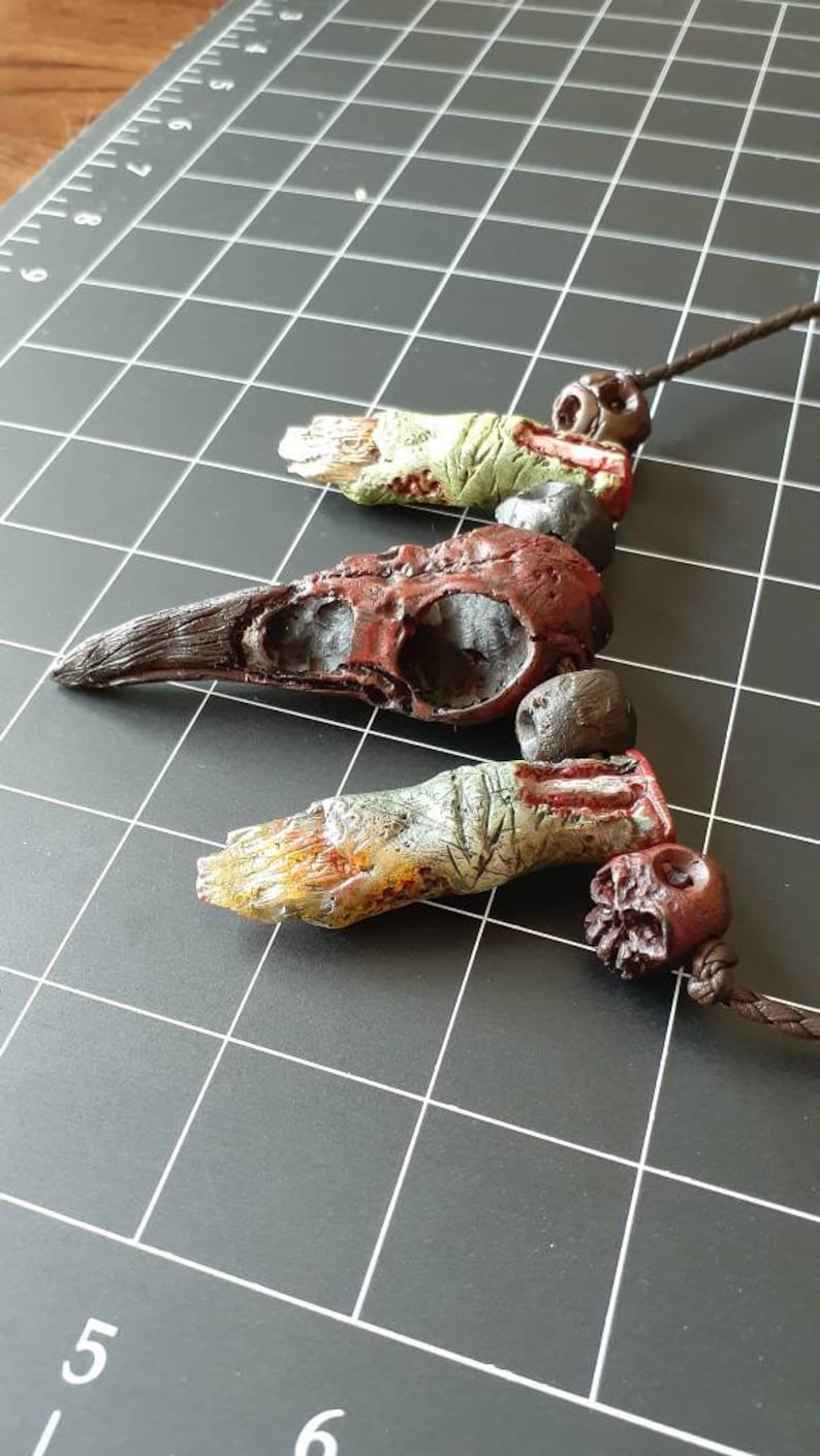 Raven crow skull and zombie finger necklace