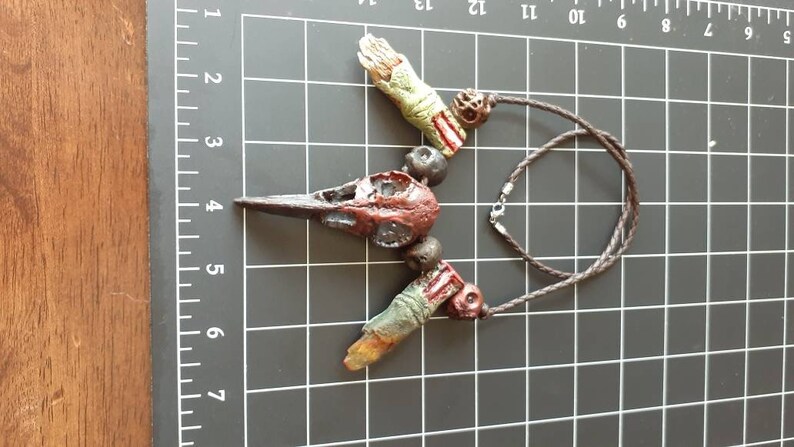 Raven crow skull and zombie finger necklace