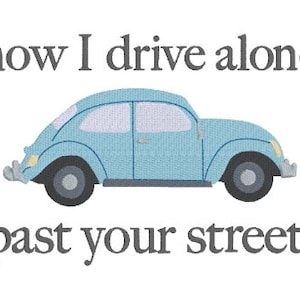 May include: A light blue vintage Volkswagen Beetle car drives past a street with the text "now I drive alone past your street" in grey.