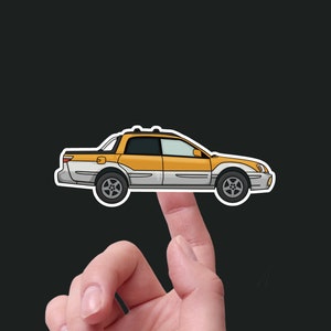 May include: A yellow and white car sticker with a white outline. The car is a Subaru Baja.