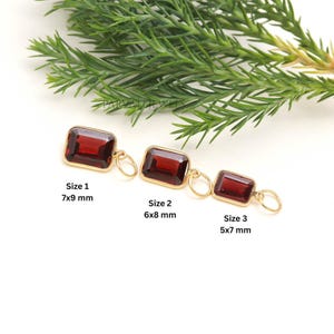 May include: Three rectangular red gemstone pendants set in gold frames with attached jump rings. The pendants are labelled as Size 1 at 7x9 mm, Size 2 at 6x8 mm, and Size 3 at 5x7 mm. The text PARVATIJEWELS is visible above the pendants.