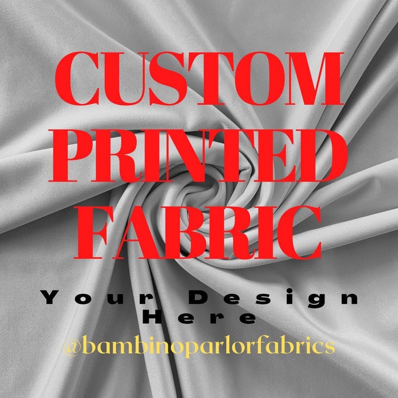 May include: A close-up of gray fabric with the words "CUSTOM PRINTED FABRIC" in red. Below, in black, it says "Your Design Here" and the Instagram handle @bambinoparlorfabrics in gold.