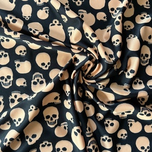 STRETCH PRINTED FABRIC - Orange Skulls on Black print Fabric - spandex Print Fabric - 4 way Stretch Printed Spandex Fabric - Fabric bty