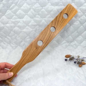 Wooden spanking paddle for adults