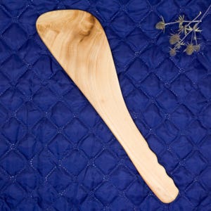 Wooden spanking paddle for adults