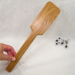 Wooden spanking paddle for adults