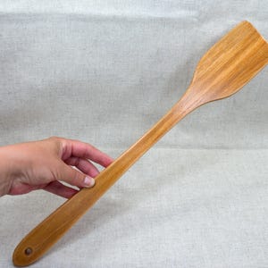 Wooden spanking paddle for adults