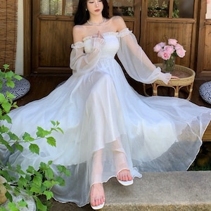 White swing dress with sleeves top