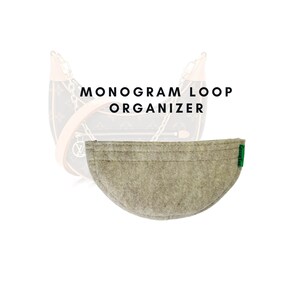 May include: A beige felt bag organizer with the text "Loopin" on the side. The organizer is designed to fit inside a handbag and keep it organized.