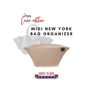 May include: A beige bag organizer with a green accent, and a white handbag in the background. Text reads "2mm Luxe edition" and "MIDI NEW YORK BAG ORGANIZER". A "MADE IN USA" emblem is at the bottom.