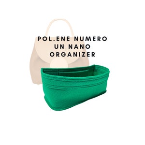 May include: A green felt bag organizer for a Polene Numero Un Nano bag. The organizer has multiple compartments and pockets to help keep your bag organized.