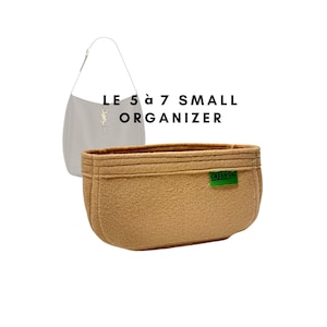 May include: A beige felt bag organizer with the text "GREEN TAG" on a green label. The organizer is designed to fit inside a "LE 5 à 7 SMALL ORGANIZER" handbag.