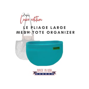 May include: A turquoise blue mesh tote bag organizer with the text "GREENBAG" on a green tag. The organizer is made in the USA and is designed to fit inside a large tote bag. The text "2mm Luxe edition LE PLIAGE LARGE MESH TOTE ORGANIZER" is above the organizer.