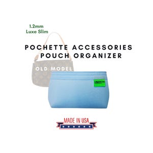 May include: Light blue felt pouch organizer for a handbag. The pouch has a green tag with the text "GREENTAG" and the text "OLD MODEL" is visible on the brown handbag in the background. The text "POCHETTE ACCESSORIES POUCH ORGANIZER" is at the top of the image. The text "MADE IN USA" is at the bottom of the image with five stars.