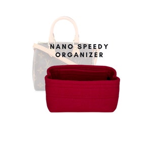 May include: Red felt organizer for a Nano Speedy handbag. The organizer has multiple compartments and pockets to keep your belongings organized.