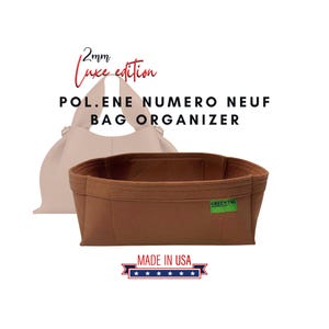 May include: A brown felt bag organizer with the text "Greentags" and "Made in USA" on it. The organizer is designed to fit inside a light brown handbag. The text "2mm Luxe edition" and "POL.ENE NUMERO NEUF BAG ORGANIZER" is visible above the bag.