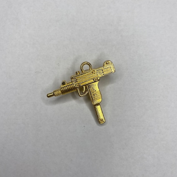 Gold Gun Croc Charm