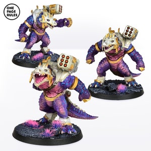 May include: Three purple and gold painted miniature dinosaur figures with guns on their backs. The dinosaurs are standing on black bases with pink grass.
