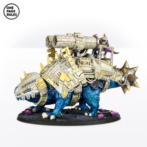 May include: A blue and white painted miniature of a creature with a large cannon on its back. The creature is standing on a black base with pink and purple accents.