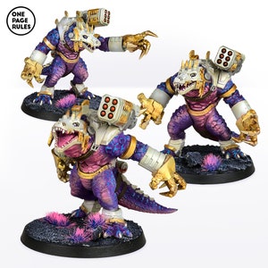 May include: Three purple and blue painted miniature figures of reptilian creatures with gold accents and weapons. The figures are standing on black bases with pink tufts of grass.