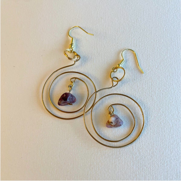 Gold wire earrings with purple stone