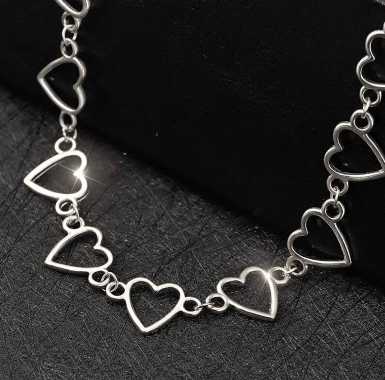 silver stainless steel heart choker