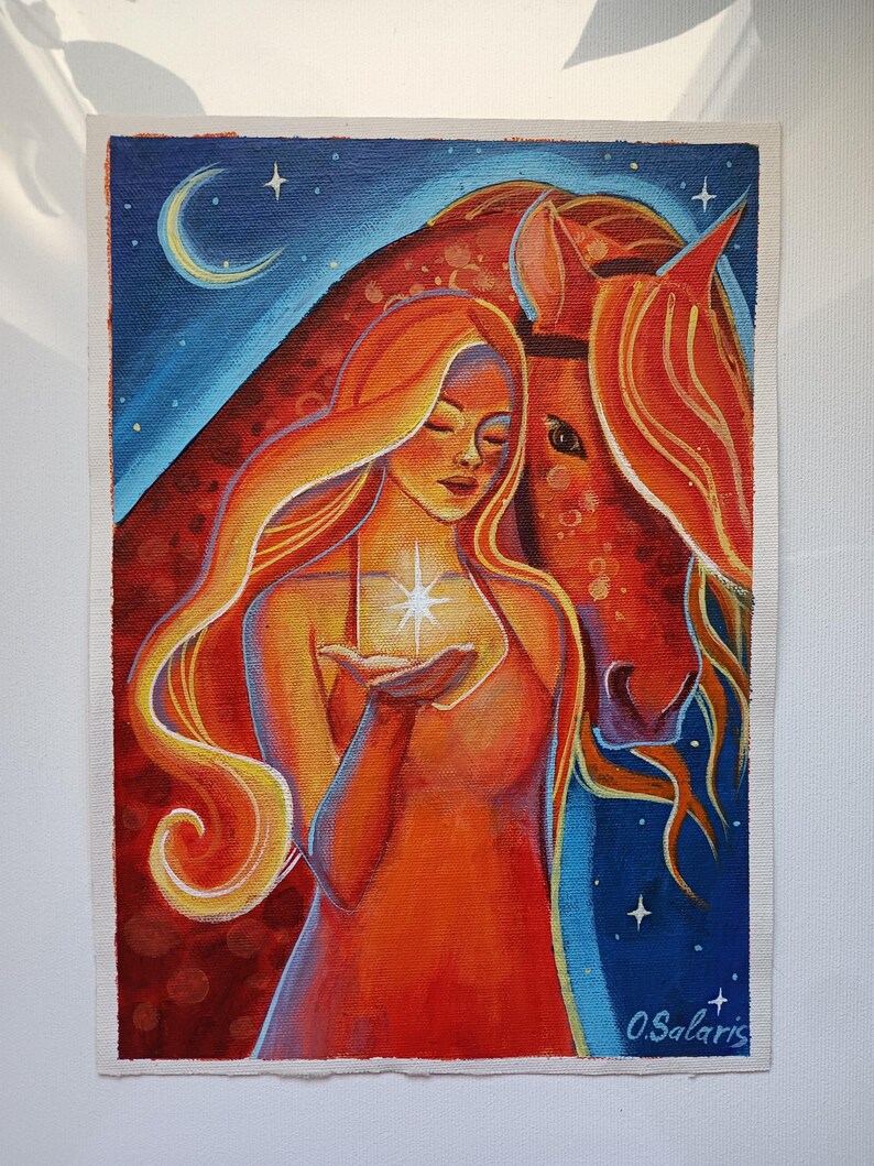 May include: An original painting depicting a woman with long, flowing orange hair, holding a glowing star. A reddish-brown horse is beside her, set against a blue night sky with a crescent moon and stars. The artwork is signed "O. Salaris".