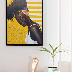 Modern dining room featuring the original Black woman portrait displayed on a neutral wall above a white sideboard