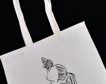 Tote bag designated with embroidery design