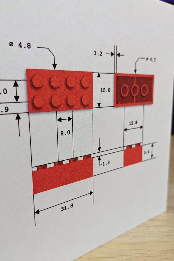 Buy A Card With an Illustration of a Lego like Brick With Its