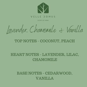 May include: A green and white graphic with the text "VELLE DOMUS SCENTS OF HOME" and the text "Lavender. Chamomile & Vanilla" in cursive. The text "TOP NOTES - COCONUT, PEACH" is below the cursive text. The text "HEART NOTES - LAVENDER, LILAC, CHAMOMILE" is below the top notes. The text "BASE NOTES - CEDARWOOD, VANILLA" is below the heart notes.