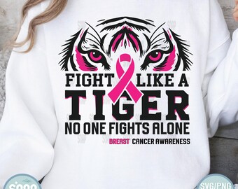 May include: A white sweatshirt with a pink ribbon and a black and white tiger face graphic. The text "Fight Like A Tiger No One Fights Alone Breast Cancer Awareness" is printed on the sweatshirt.