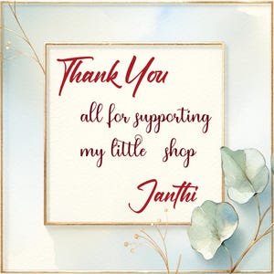 May include: A framed card with the words "Thank You" and "all for supporting my little shop Janthi" in burgundy script. The frame is gold, with watercolor-style blue and green accents.