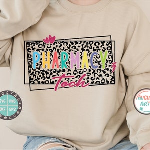 May include: A beige sweatshirt with a colorful "Pharmacy Tech" graphic on the front. The graphic is surrounded by a black leopard print frame with two pink hearts above the text.