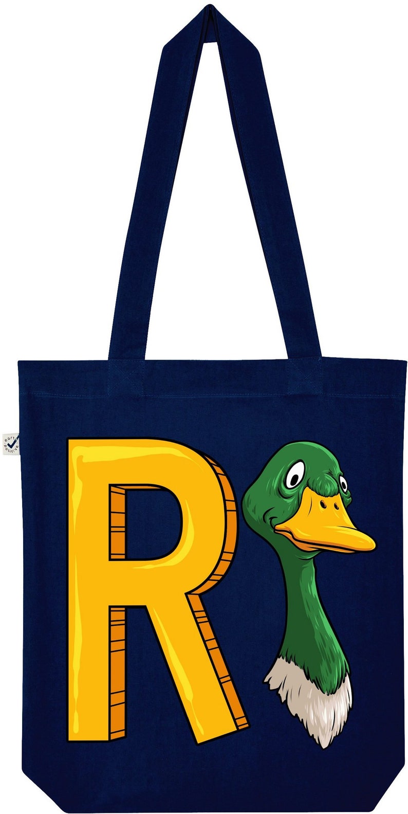 May include: A navy blue tote bag with a yellow letter R and a green duck with a white beak and white feathers on its neck. The duck is looking to the right.