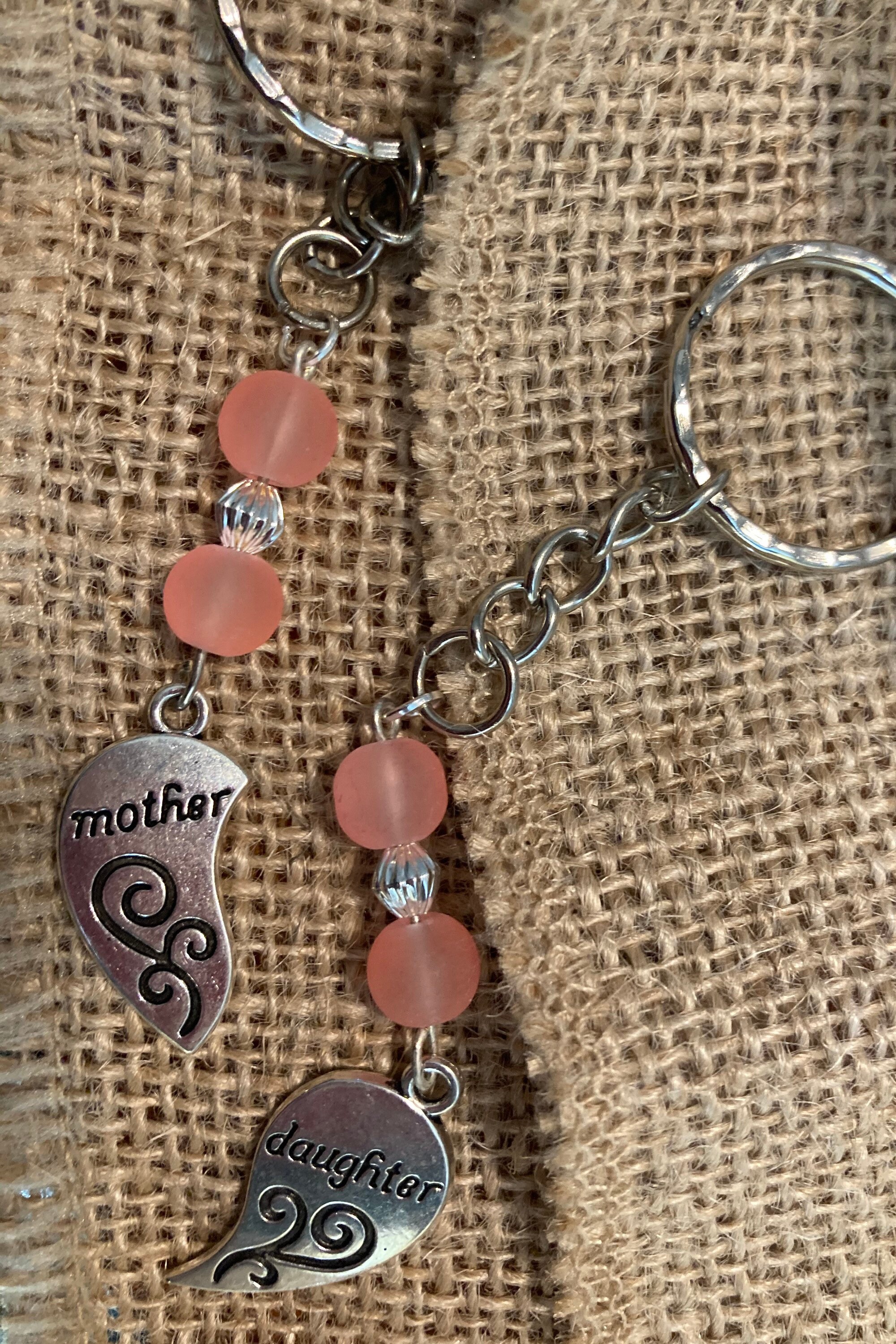 Mother and daughter keychains when together form a heart. Etsy