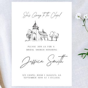 May include: A black and white illustration of a church with the text "She's Going to the Chapel" above it. The text "Please join us for a bridal shower honoring Jessica Smith" is below the illustration. The text "123 Chapel Road | Augusta, GA September 10th at 1 o'clock" is at the bottom of the invitation.