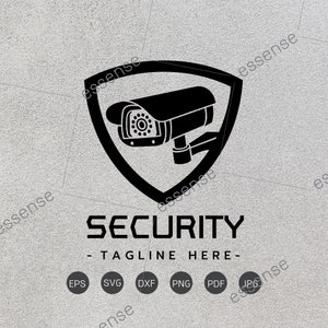 May include: Black and white logo design for a security company. The logo features a security camera inside a shield with the word "SECURITY" and the tagline "TAGLINE HERE" below.