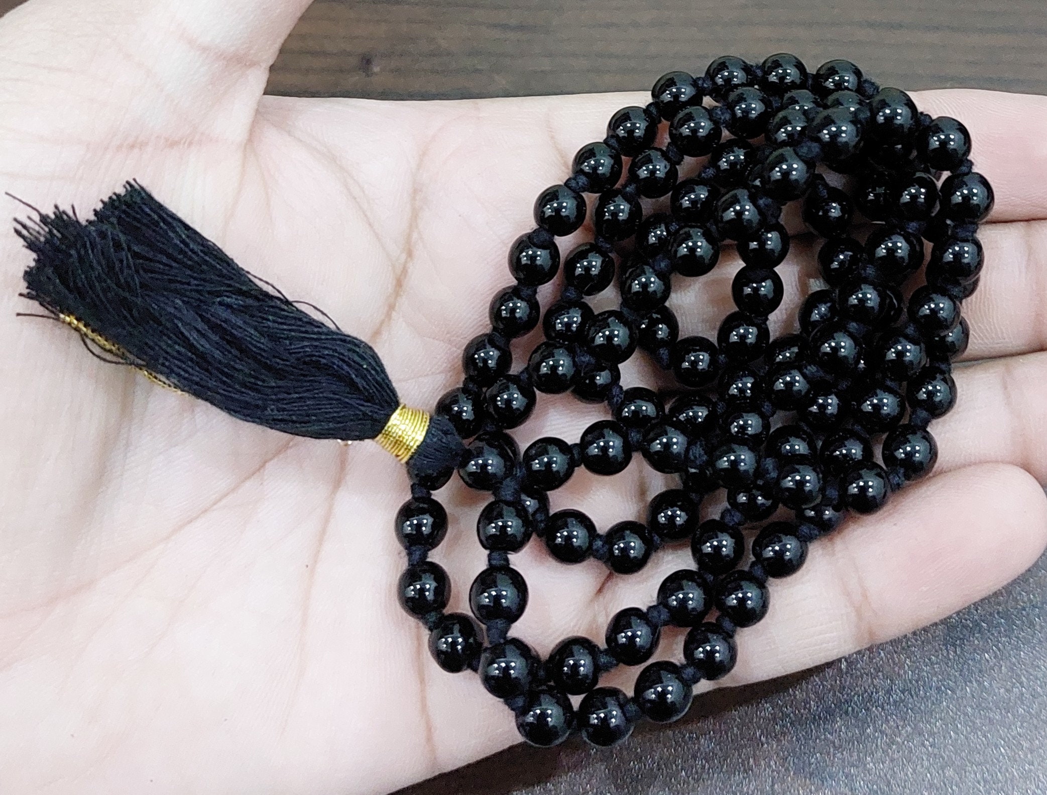 Original black hakik mala deals