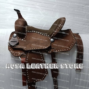 Premium Quality Western Leather Barrel Rough Out Saddle With Free Matching Headstall, Breast Collar, Front Cinch And Back Cinch.