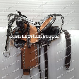Western Leather Barrel Rough Out Saddle Decorated With Blue Rhinestones With Free Matching Headstall, Breast Collar, Front and Back Cinches.