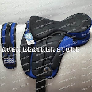 Treeless Synthetic Freemax Saddle With Stirrups And Matching Girth. Available In Various Sizes And Color Options.
